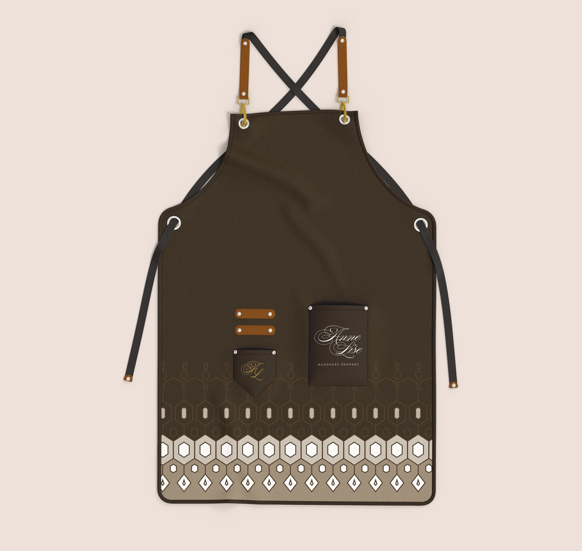 The identity on a maker’s apron, with the pattern along its lower edge.